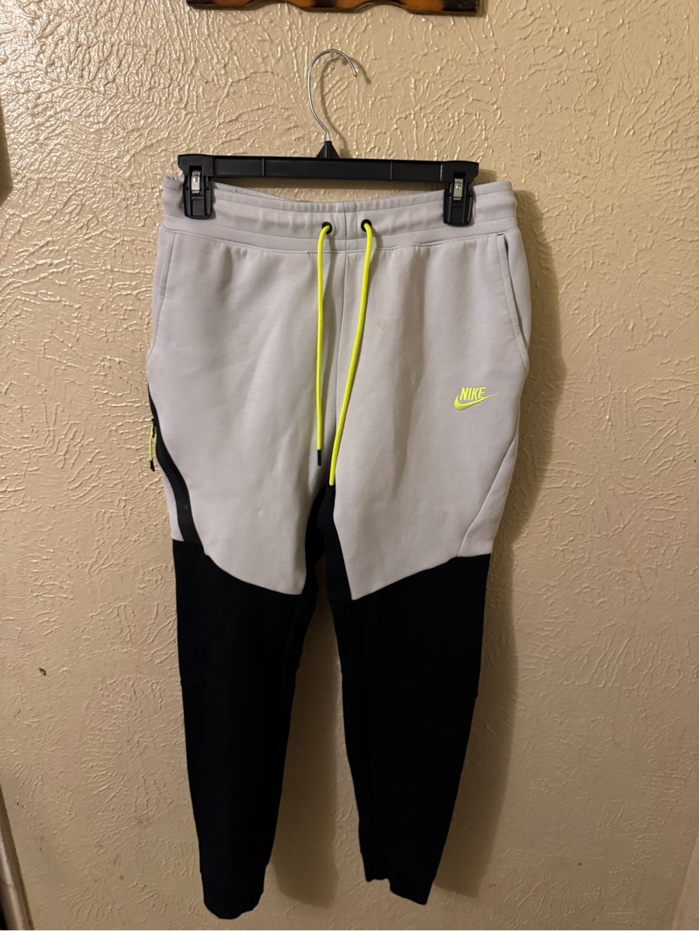 Nike Gray and Black Joggers with Neon Yellow Accents with Small stain